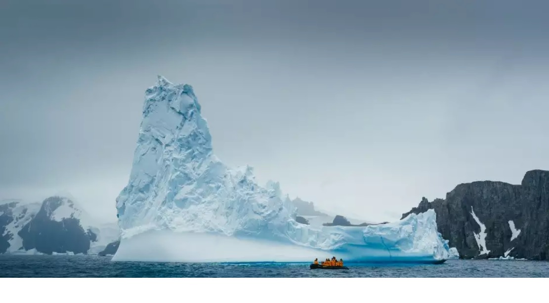 zodiac crossing icebergs